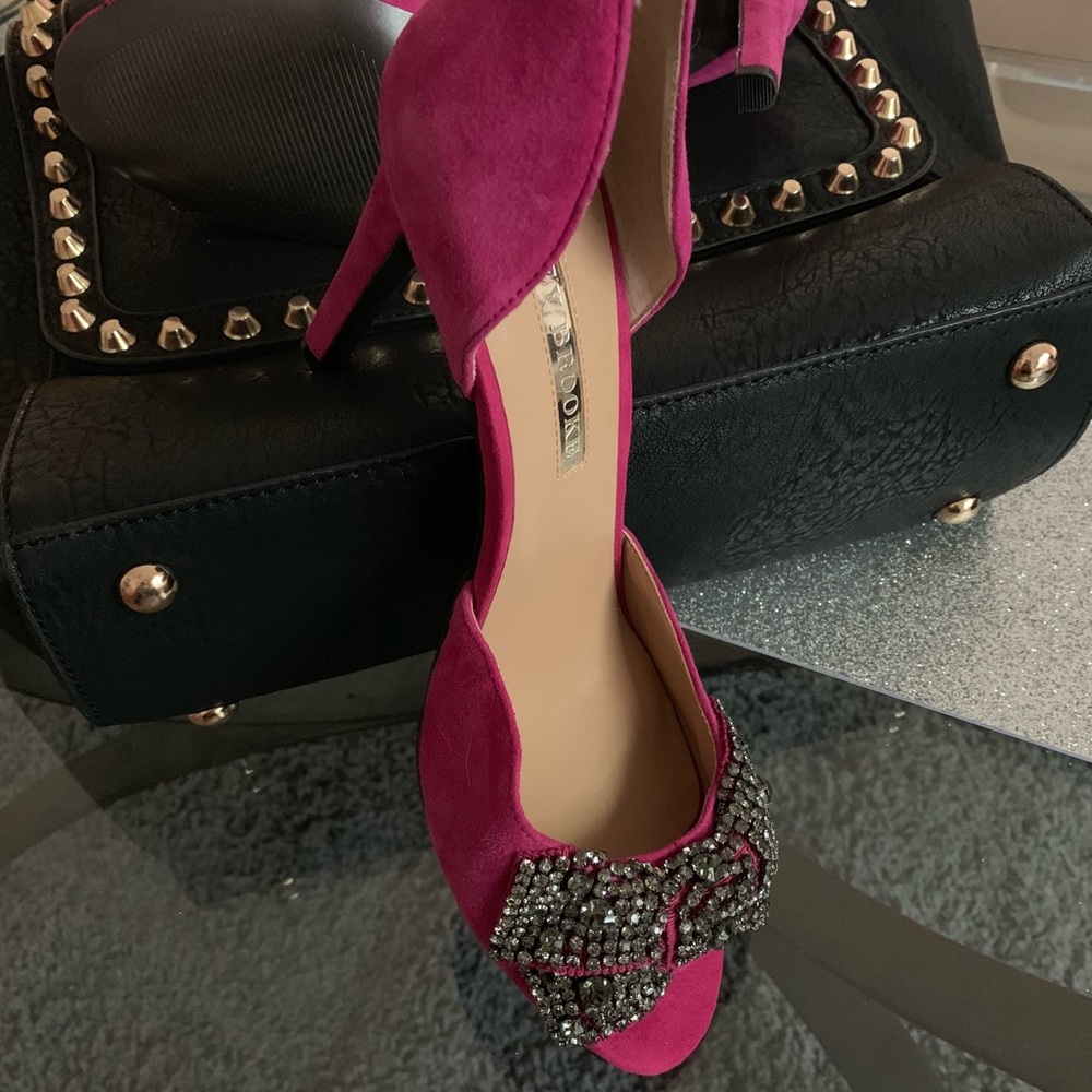 Pink pumps with embellishments